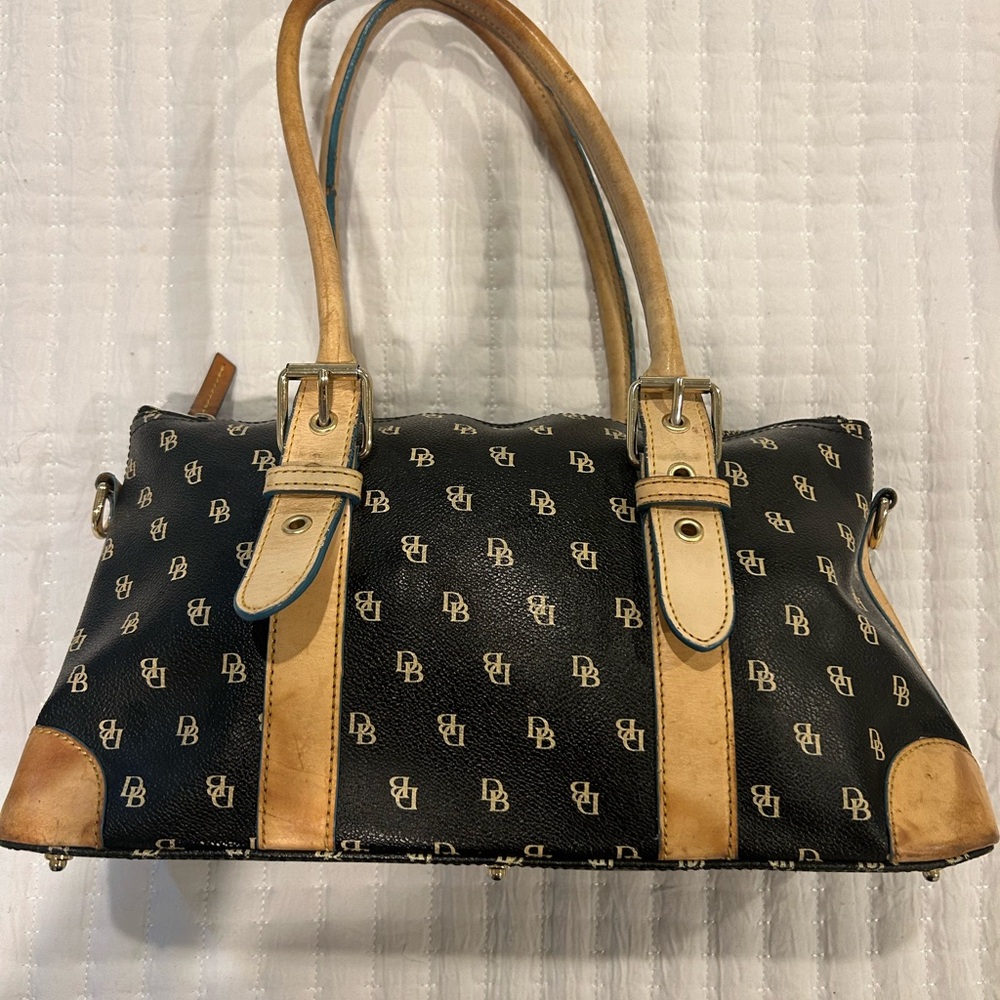 Dooney & Bourke Black and Tan Boston Bag with Vachetta wear.